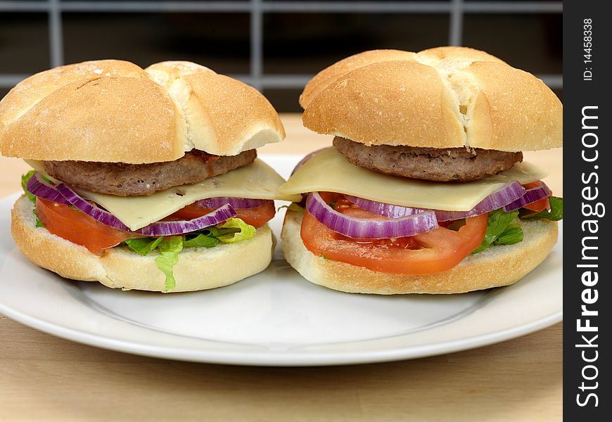 A freshly made American style hamburger with sauce