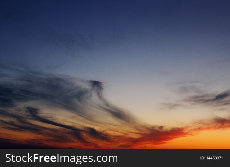 The beautiful cloudy sky during a sunset. The beautiful cloudy sky during a sunset