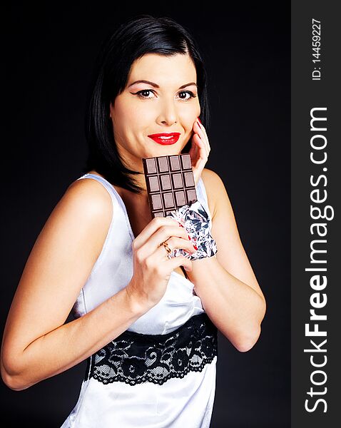 Girl eating chocolate