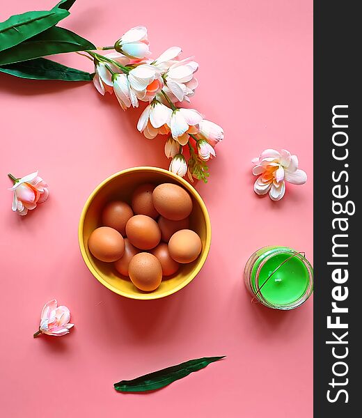 Eggs  Protein rich food vitamin Pink white apple flowers  green aroma  candle yellow plate on pink  Healthy  f