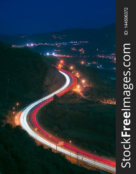 Car Light Trails In Highway At Night