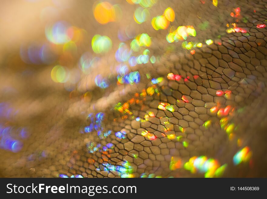 Glittering golden texture defocused bokeh light