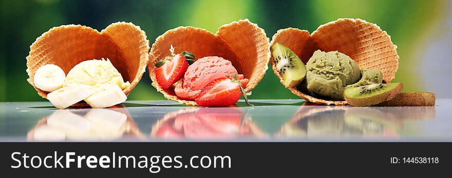 Set Of Ice Cream Scoops Of Different Colors And Flavours With Berries And Fruits