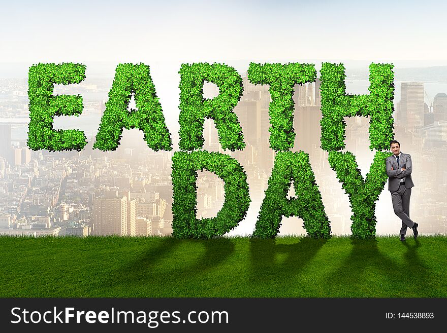 The businessman in earth day responsible business concept