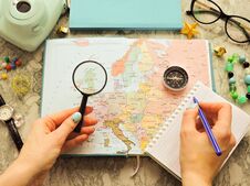 Top View Of A Map And Items. Planning A Trip Or Adventure. Travel Planning Dreams. Royalty Free Stock Image
