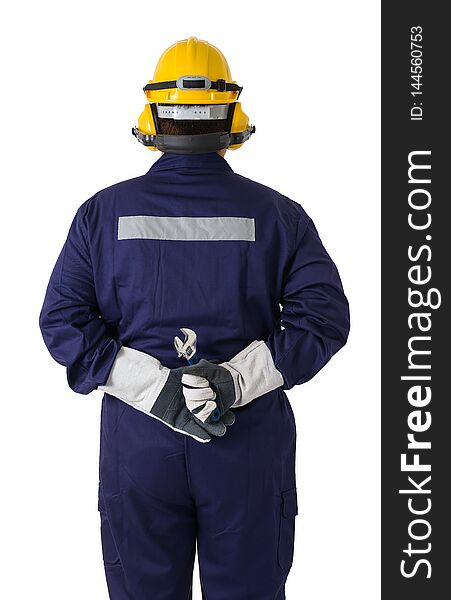Back view portrait of a worker in Mechanic Jumpsuit is holding a wrench with helmet, earmuffs, Protective gloves and Safety goggles isolated on white background clipping path. Back view portrait of a worker in Mechanic Jumpsuit is holding a wrench with helmet, earmuffs, Protective gloves and Safety goggles isolated on white background clipping path