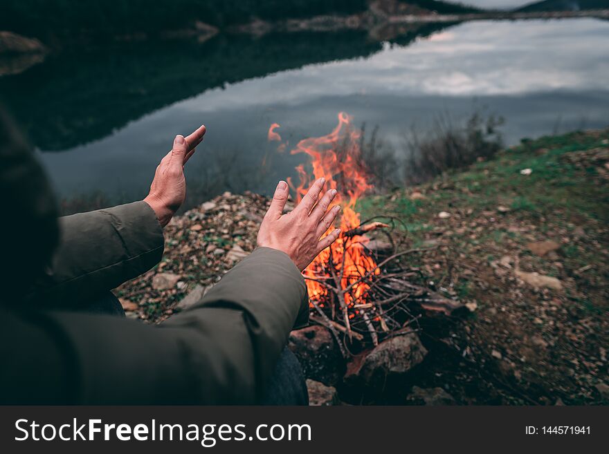 Body parts of adult female at nature. Camping. Fire. Body parts of adult female at nature. Camping. Fire