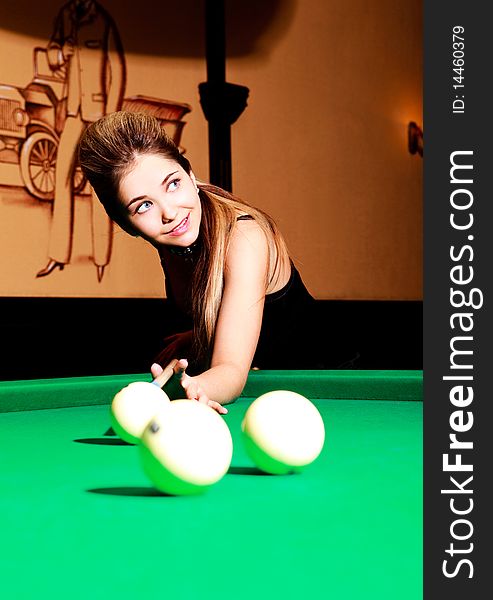 Girl Playing Billiard