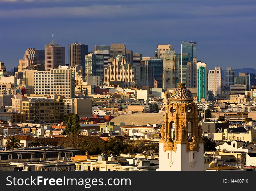 San Francisco at sunset seen from the Mission neighborhood. San Francisco at sunset seen from the Mission neighborhood.