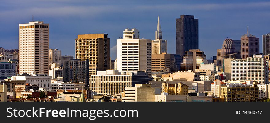 San Francisco downtown buildings at sunset. San Francisco downtown buildings at sunset.