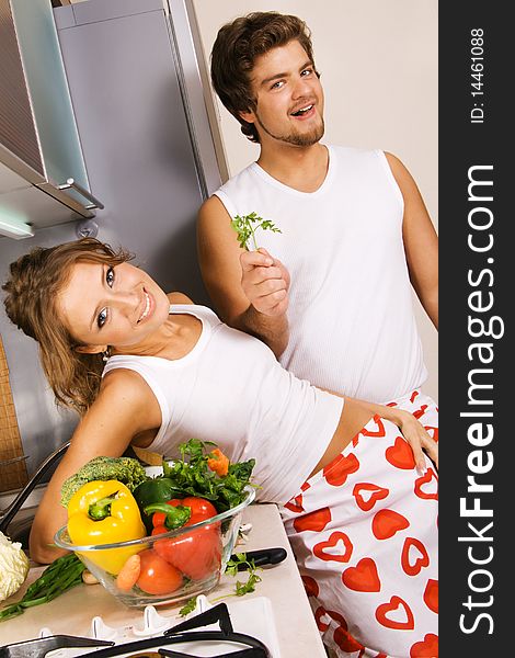 Young romantic couple in the kitchen