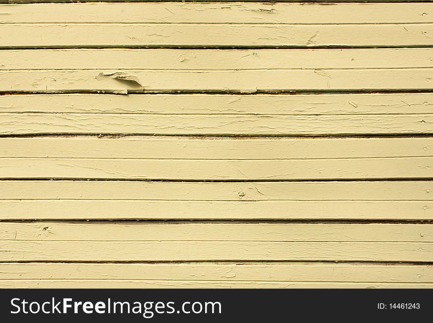 Vintage yellow wooden wall as background