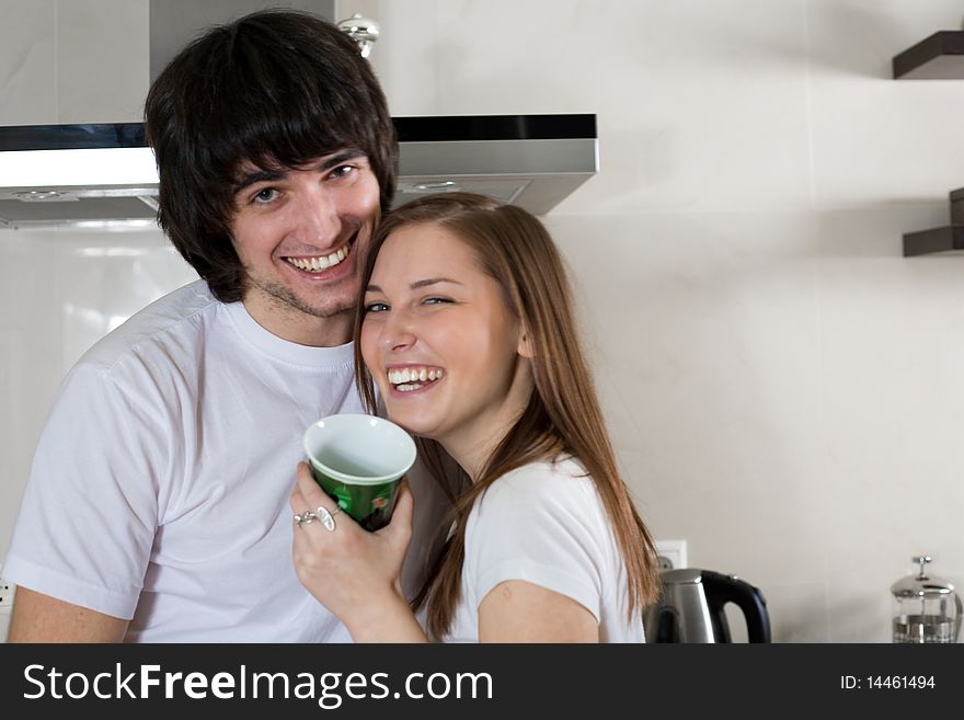 Boy with smile and girl with cup. Boy with smile and girl with cup