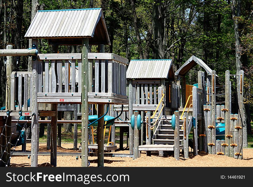 A large wooden playground structure at a park in Cadillac, Michigan. A large wooden playground structure at a park in Cadillac, Michigan.