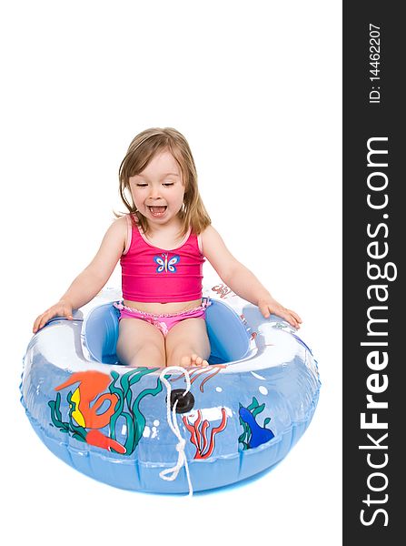 Sweet happy little girl on the beach isolated