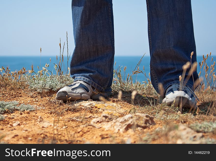 Feet In Slippers About The Sea