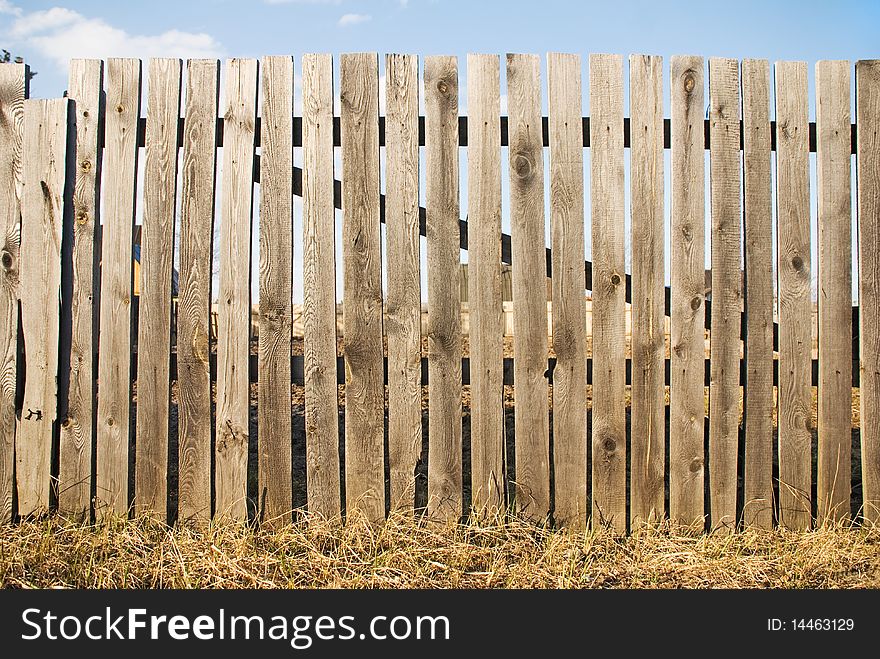 Dachnyy wooden fence from tree pine