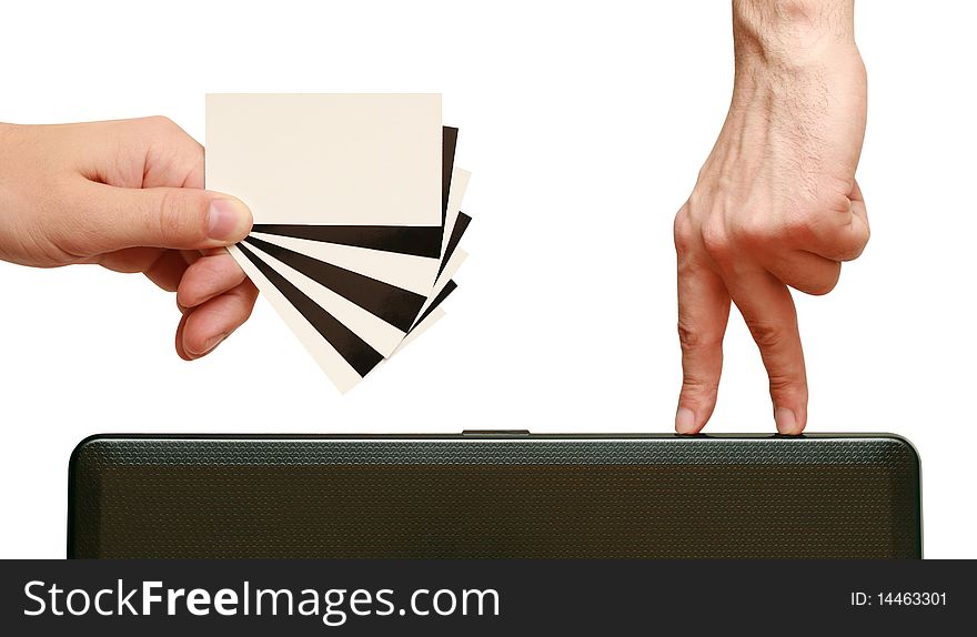 Fingers are going to contrast business card in hand on white background