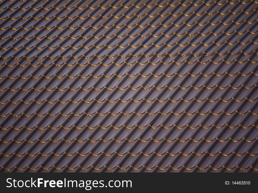 Metal tile roofing material, closeup (texture background). Metal tile roofing material, closeup (texture background)