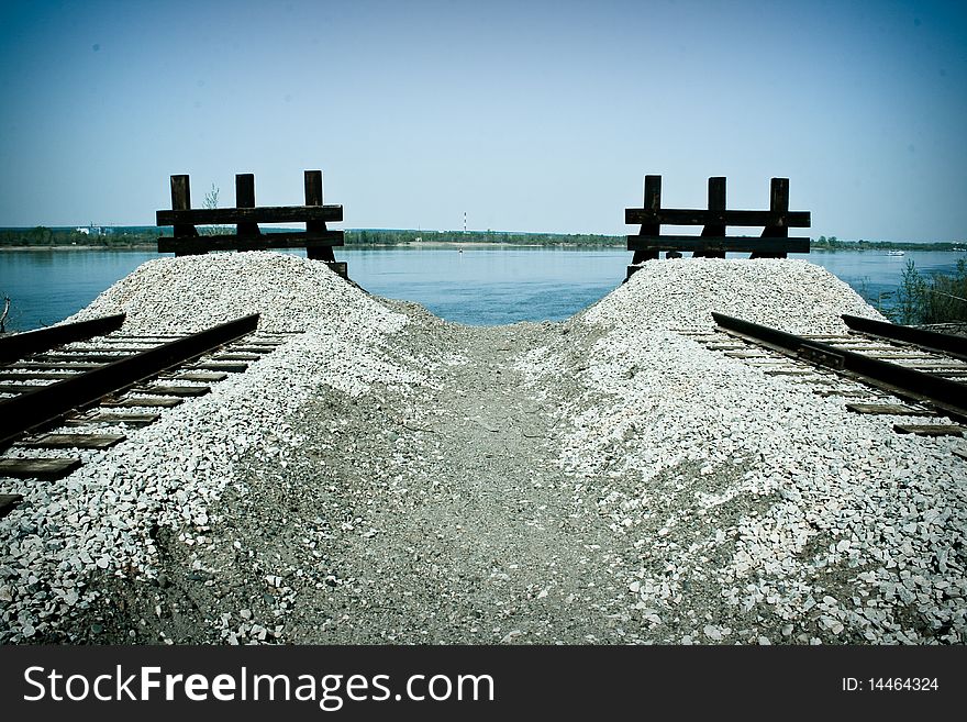 Deadlock on the railroad. but behind this barrier extends River