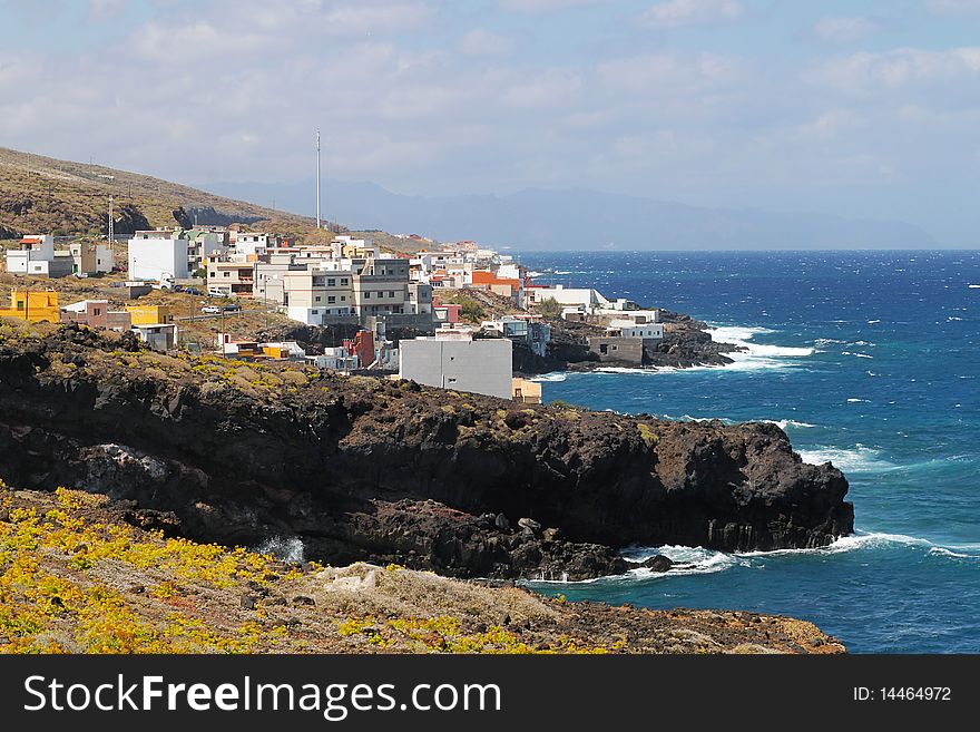 Little village in Tenerife coast and waves