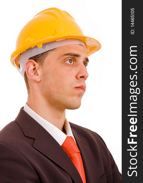 Young engineer profile with a yellow helmet on white background