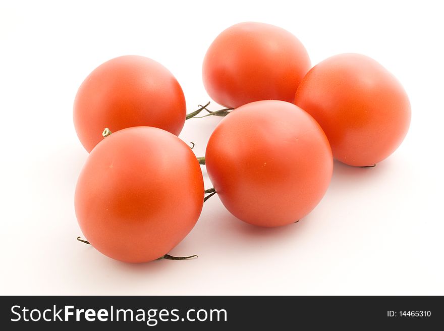 Tomatoes close-up on a white background