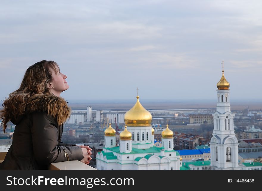 Girl against church. Russia. Rostov-on-Don. A cathedral of the Virgin. Girl against church. Russia. Rostov-on-Don. A cathedral of the Virgin.