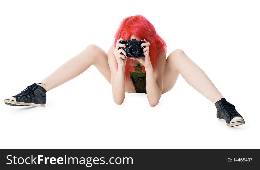 Red-hair young girl with photo camera isolated on white. Red-hair young girl with photo camera isolated on white