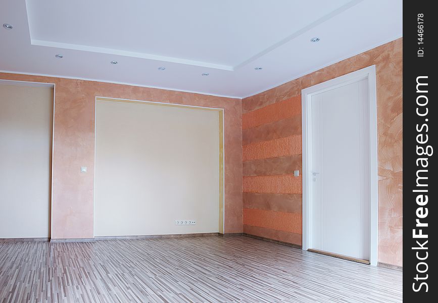 Big living room with wooden floor