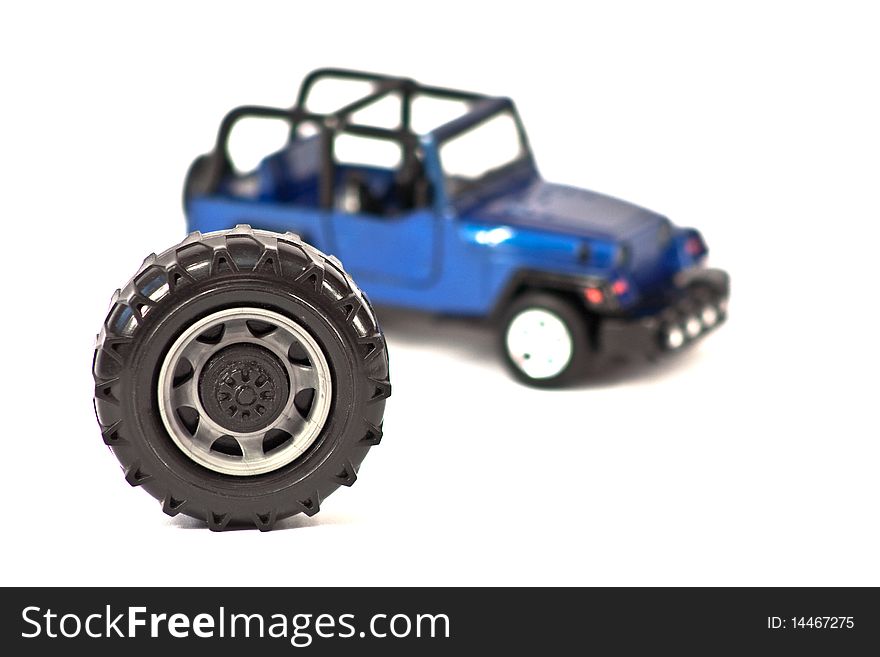 Car-SUV and the spare wheel on a white background