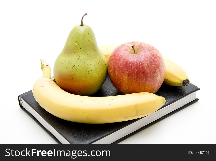 Fresh fruit on black book. Fresh fruit on black book