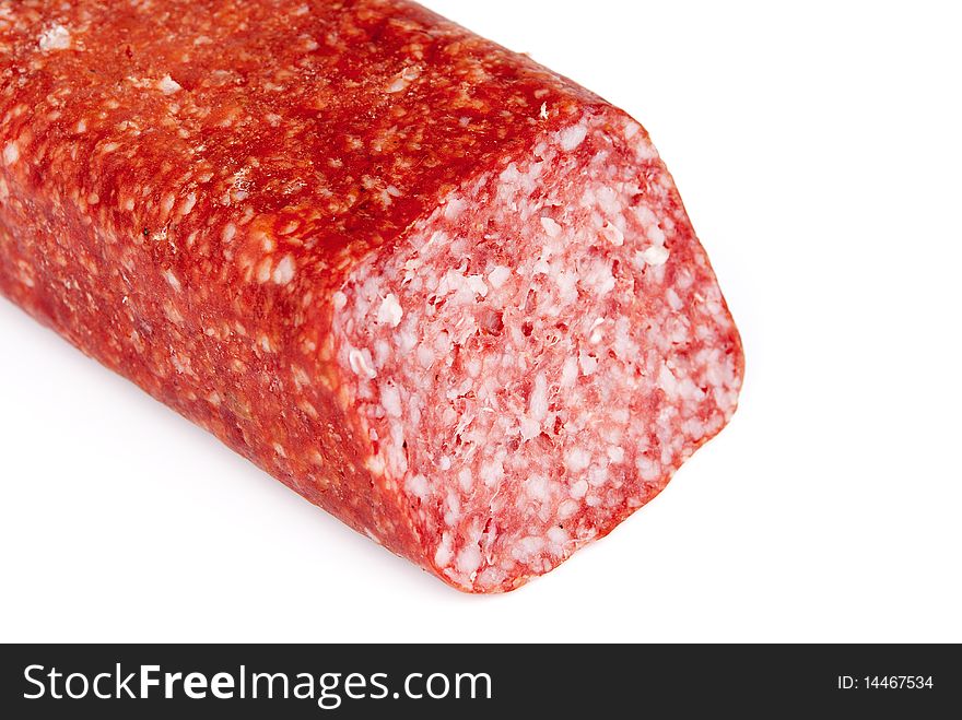 Close-up image of a salami isolated on a white background