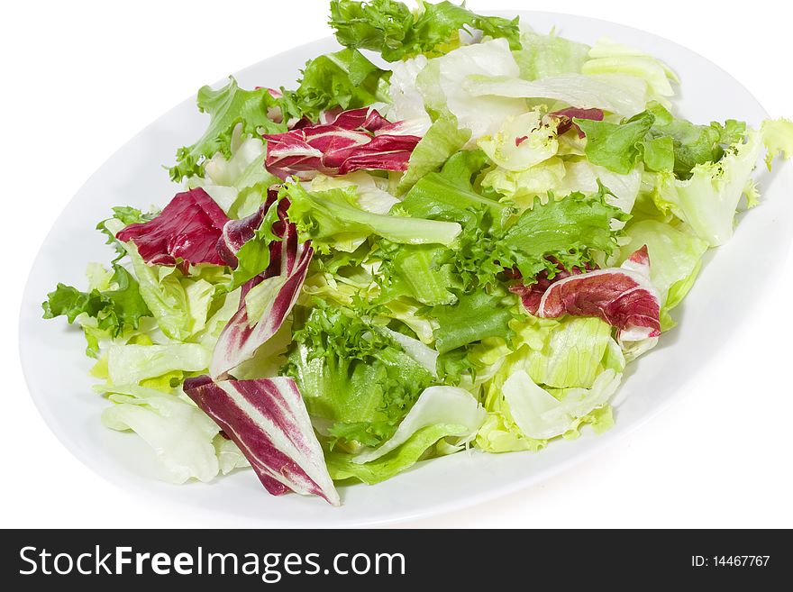 Salad mixed greens on white background