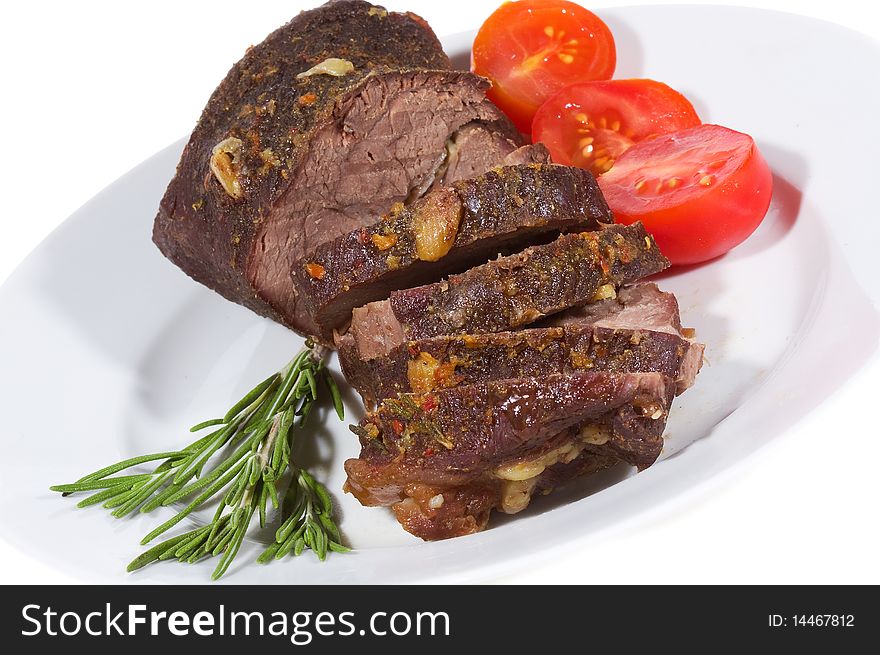 Grilled meat with vegetables on white background