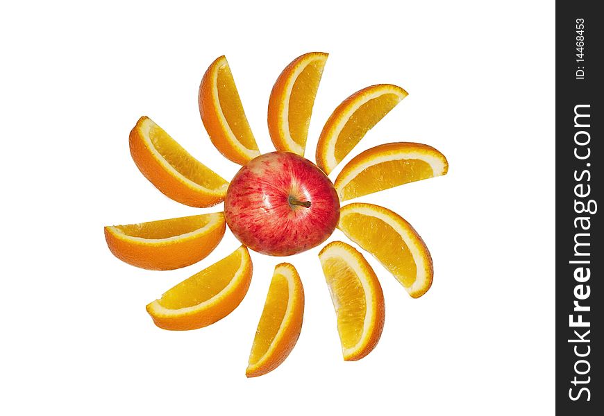 The big red apple and orange segments on a white background close up. The big red apple and orange segments on a white background close up