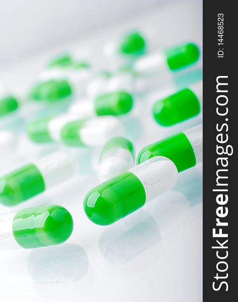 Macro heap of green pills. Macro heap of green pills