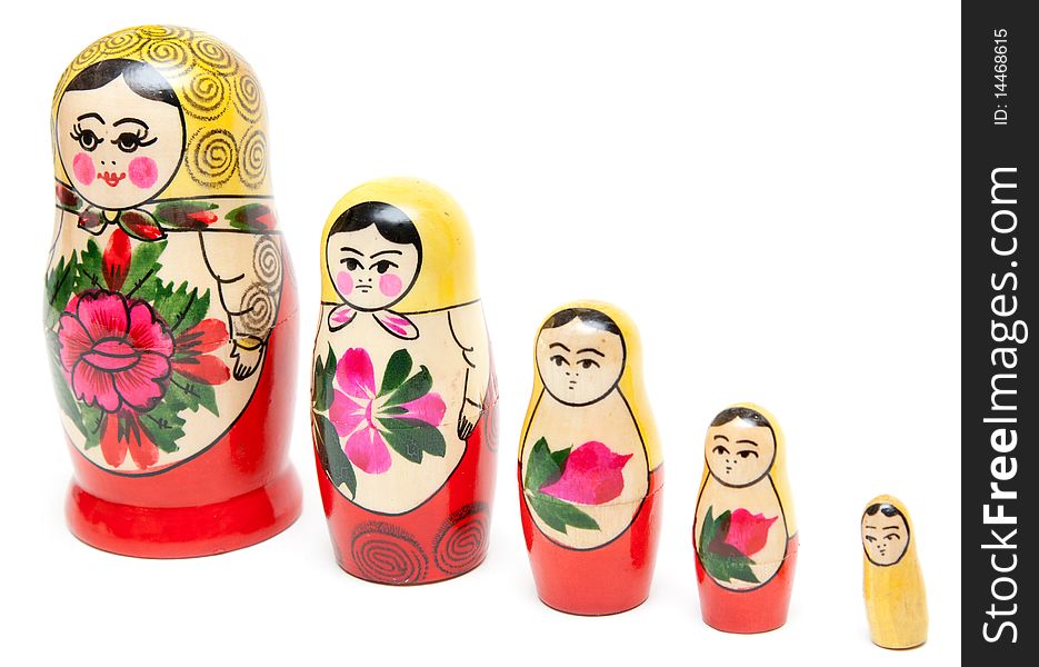 Set from five sets of nesting dolls on white background