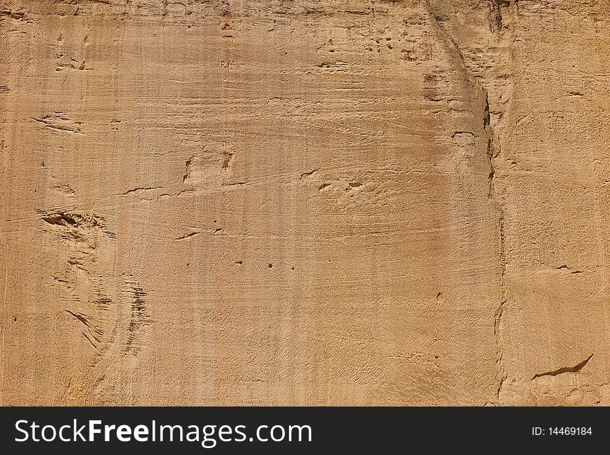 Marbled texture with natural ochre in an old mine