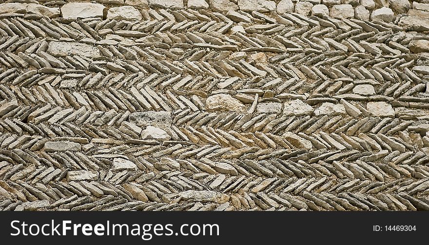 A rstoned wall in a traditional French village. A rstoned wall in a traditional French village