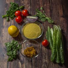 Ingredients For Cooking Tabbouleh - Levantine Vegetarian Salad. Royalty Free Stock Photography