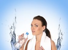 A Young And Sporty Female Is Drinking Water Royalty Free Stock Image