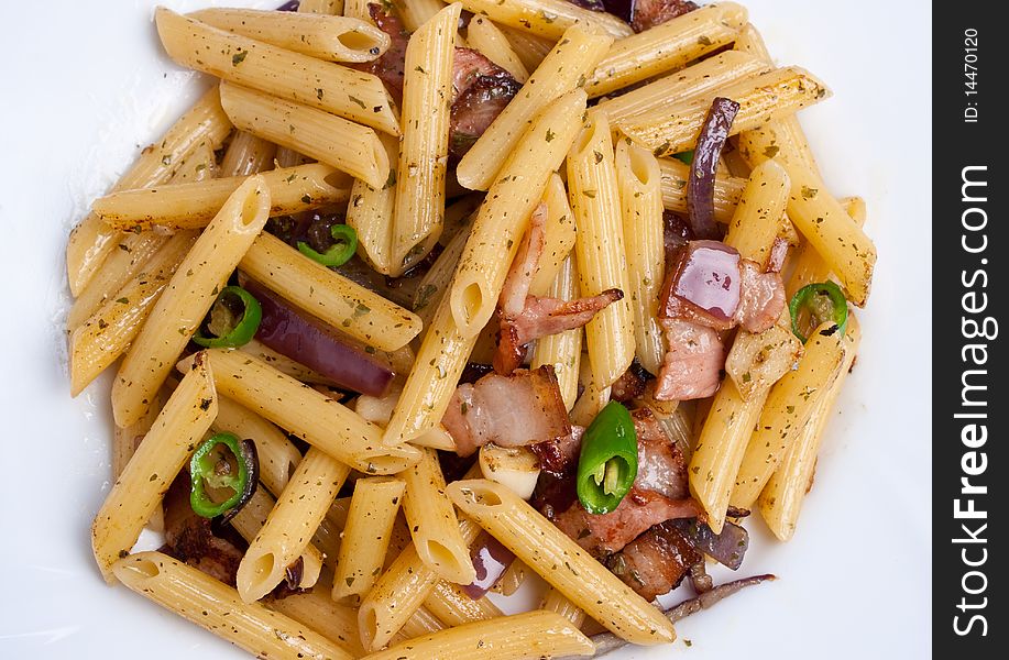 Penne with fried bacon garlic and onion
