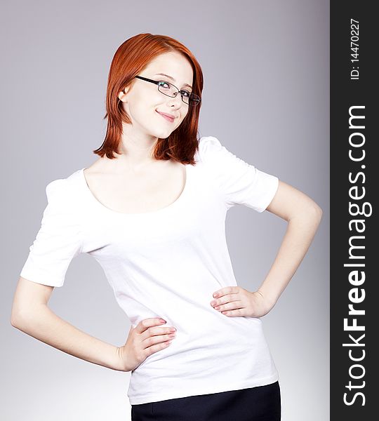 Smiling Red-haired Businesswoman In Sunglasses