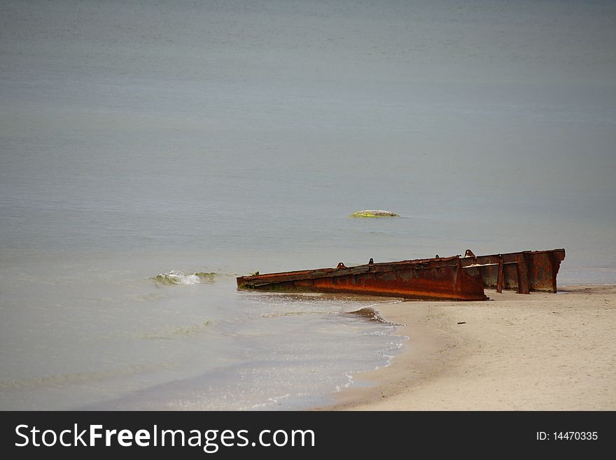 Rusty boat launch mechanism on the sea shore. Rusty boat launch mechanism on the sea shore