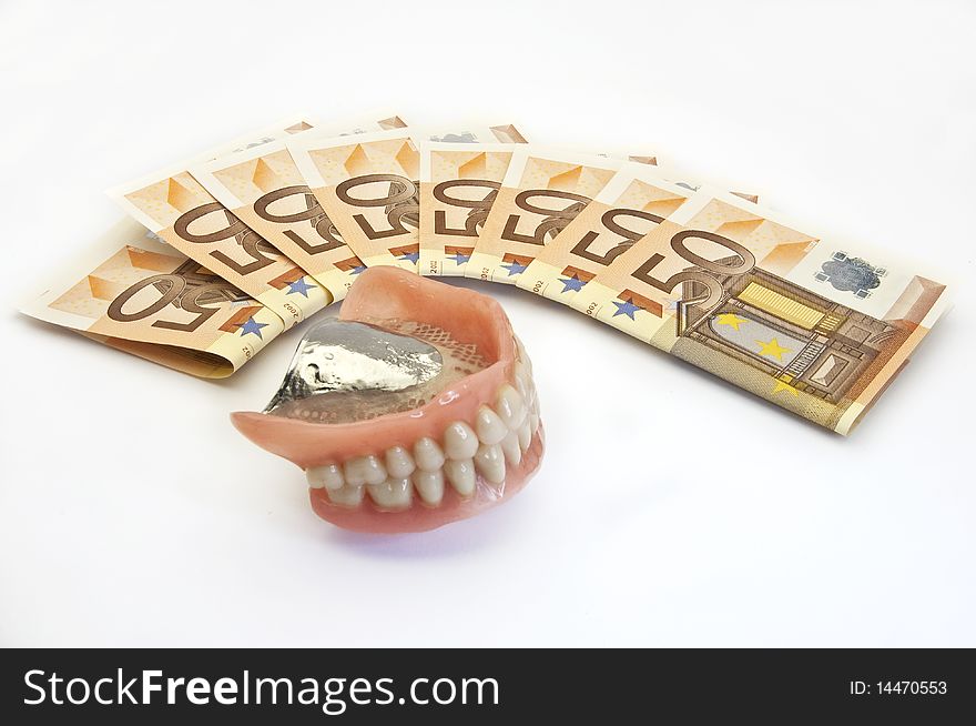 50 euro banknotes and dental prosthesis. 50 euro banknotes and dental prosthesis