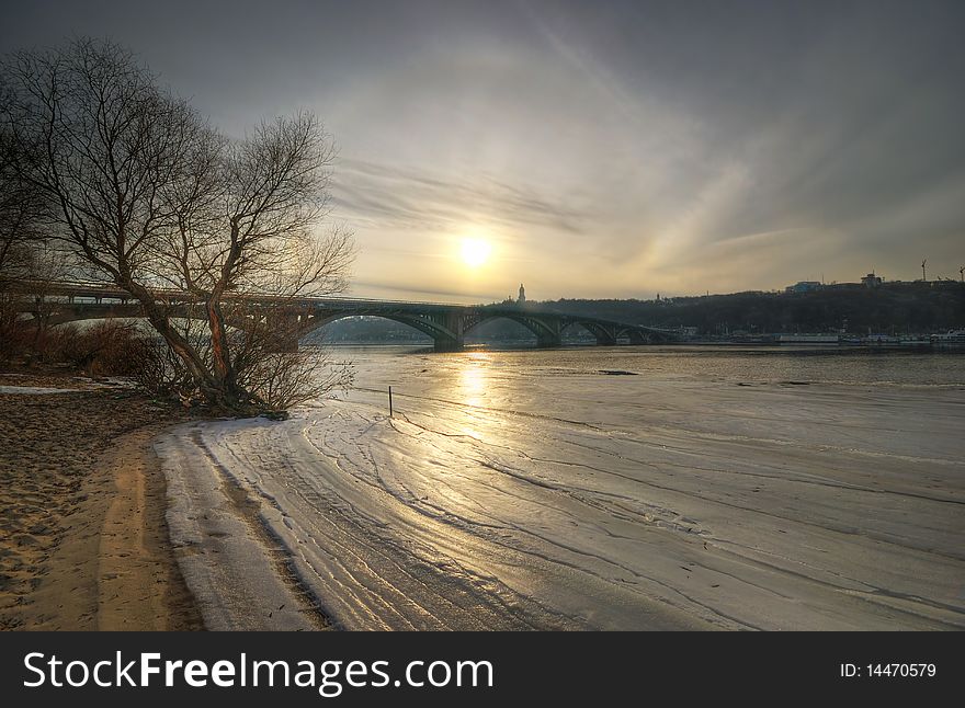 Winter landscape frozen river and bridge view