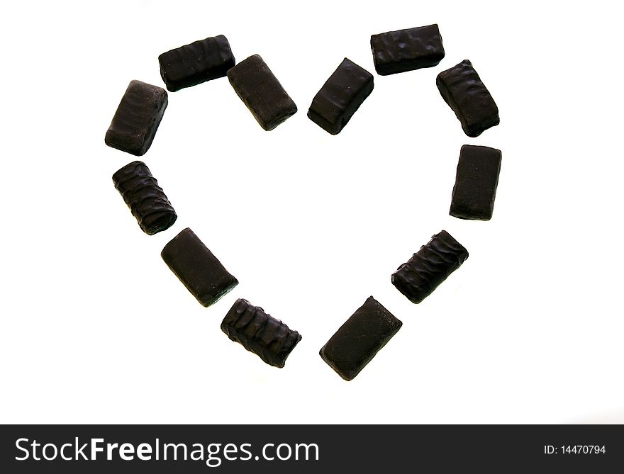 Photo of the present chocolates combined in the form of heart. Photo of the present chocolates combined in the form of heart