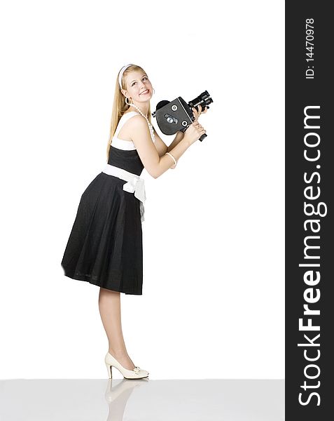 Young pretty Girl with film camera on white background