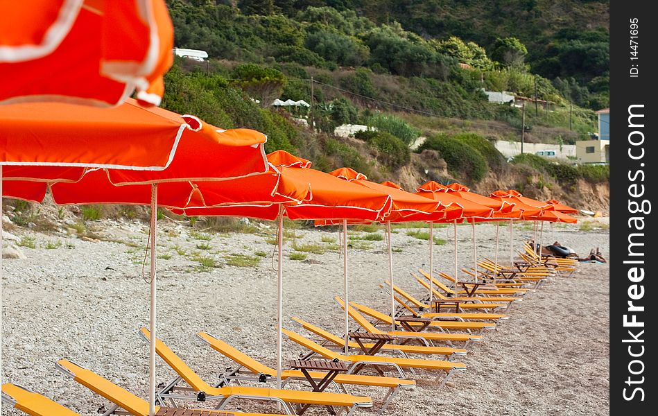 Yellow deckchair on a beach